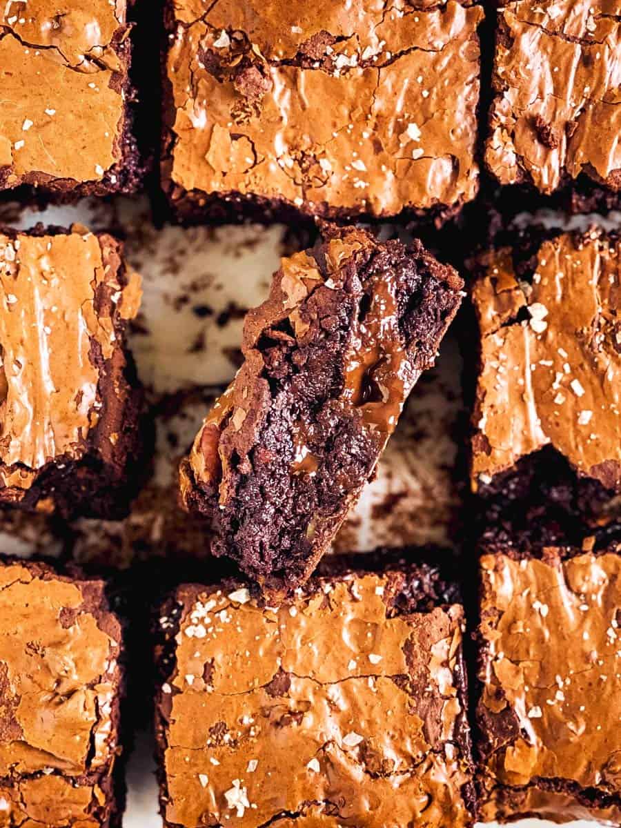 overhead view of sliced brownies with one edge facing upwards