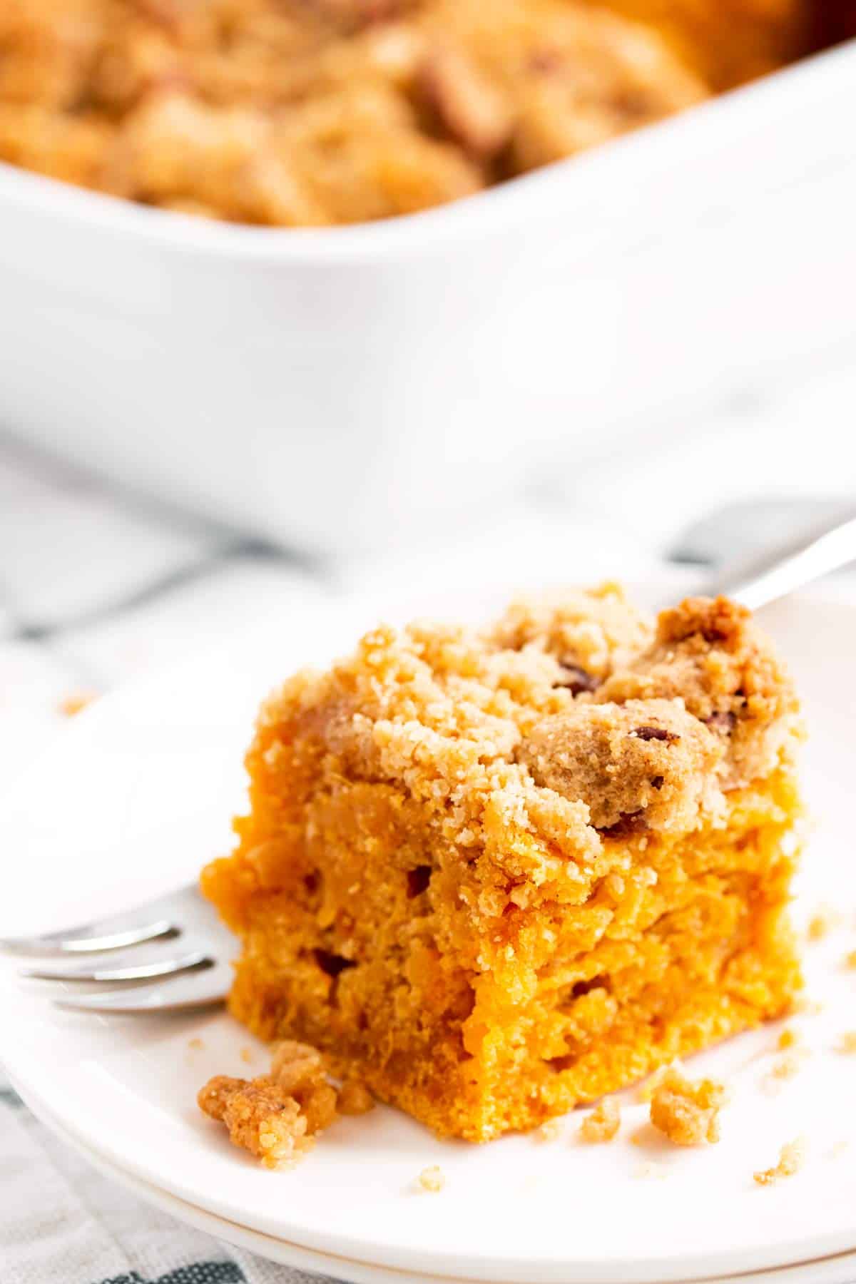 slice of sweet potato coffee cake on a white plate