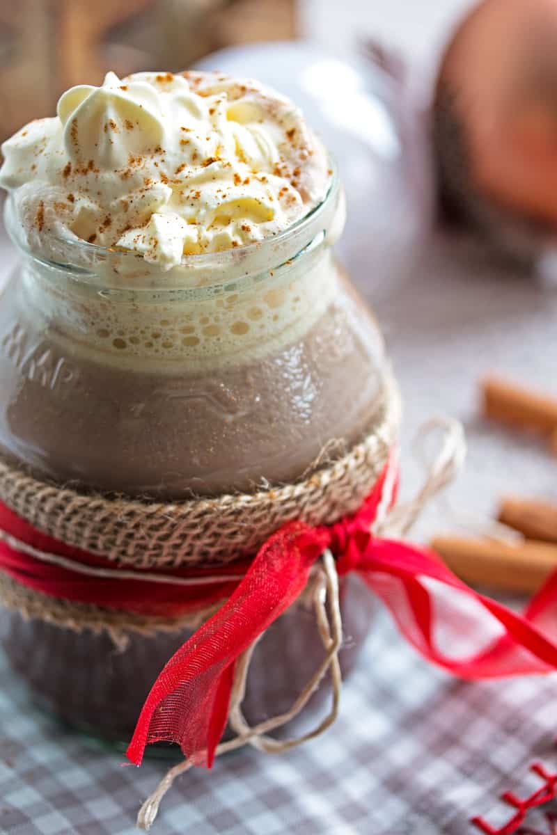 Close up photo of cup with gingerbread hot chocolate.