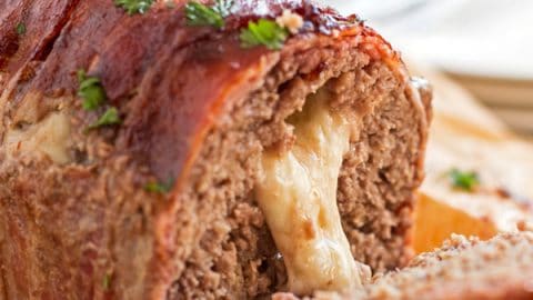 sliced cheese stuffed meatloaf with cheese oozing out