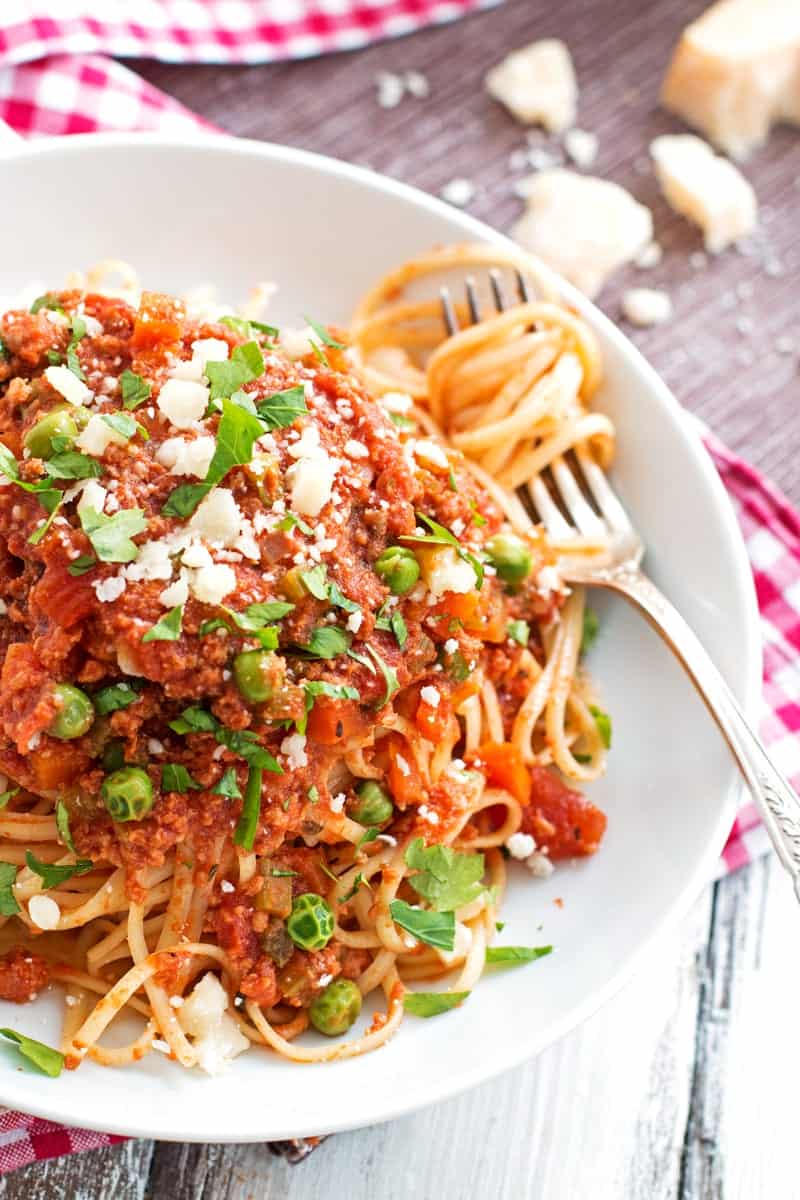 spaghetti and sauce on white plate