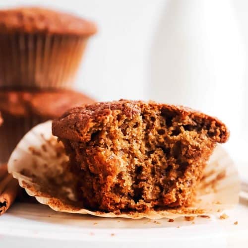 gingerbread muffin with bite taken out on white platter