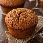 close up photo of single gingerbread muffin on a piece of jute