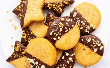 overhead photo of peanut butter shortbread cookies on white plate