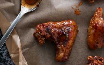 top down view on chili wings on parchment paper