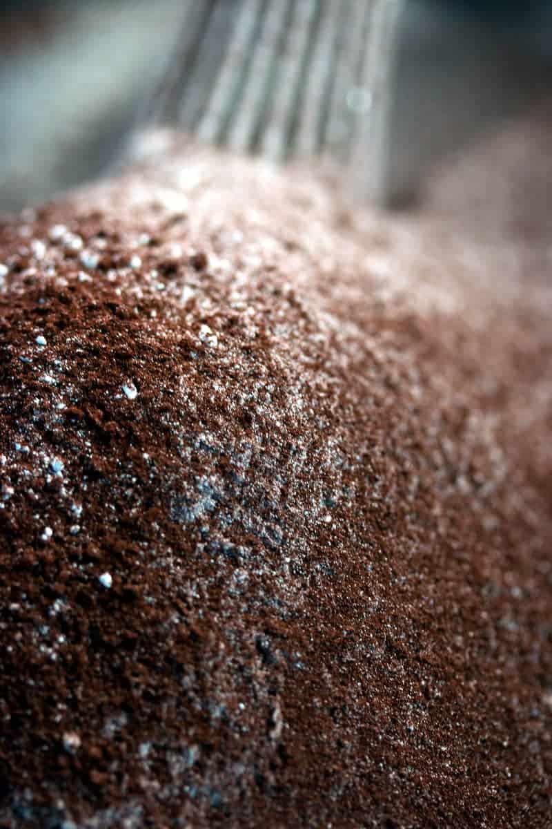 close up photo of dry ingredients for chocolate cake