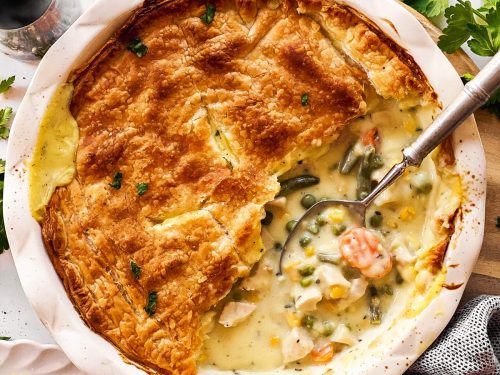 overhead view of turkey pot pie with serving spoon