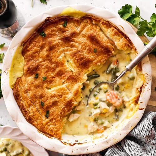 overhead view of turkey pot pie with serving spoon