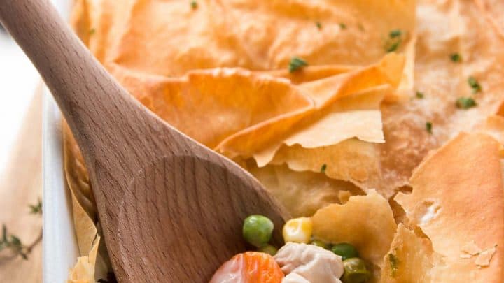 Use leftover turkey and frozen vegetables in this Healthy Easy Turkey Pot Pie recipe to serve a quick and light dinner. It uses phyllo sheets instead of puff pastry and there’s no heavy cream OR butter in the filling! | savorynothings.com