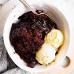 white bowl with chocolate pudding cake and ice cream