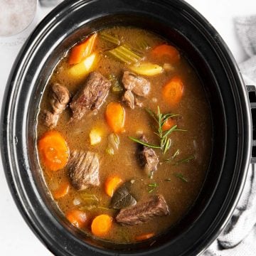 close up photo of crock with Irish beef stew inside