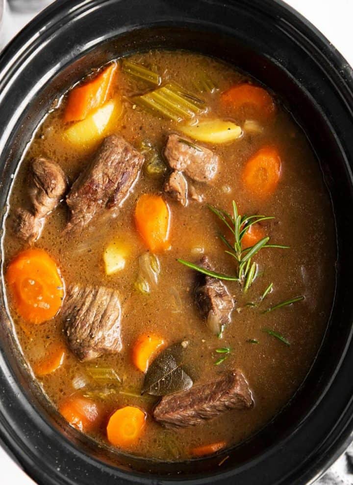 close up photo of crock with Irish beef stew inside