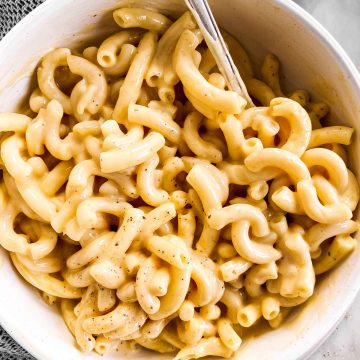 overhead view of white bowl filled with stovetop Mac and cheese