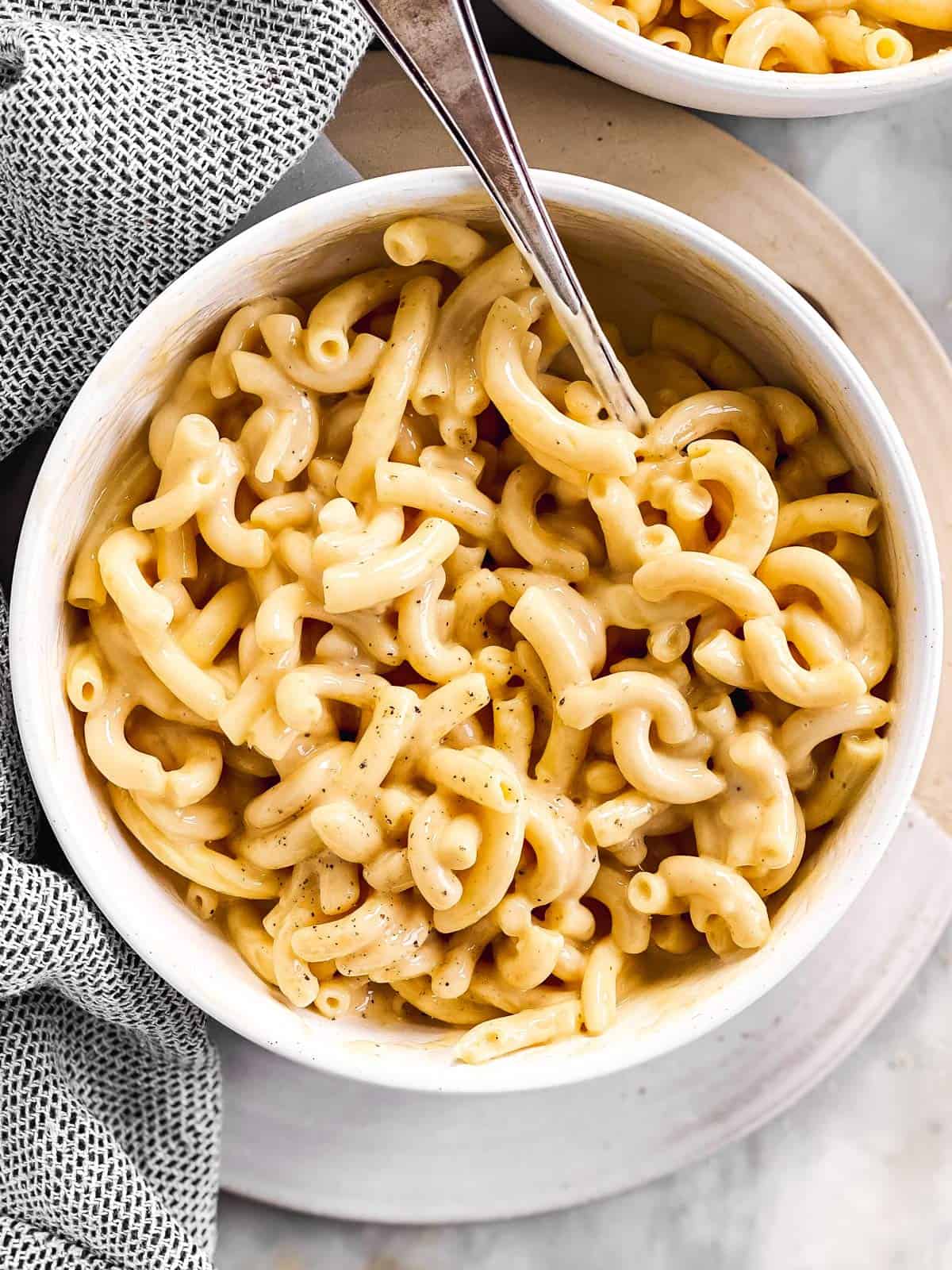 overhead view of white bowl filled with stovetop Mac and cheese