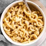 overhead view of white bowl filled with stovetop Mac and cheese