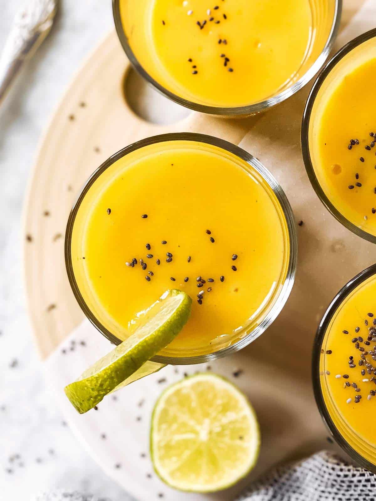 overhead view of glass with mango smoothie