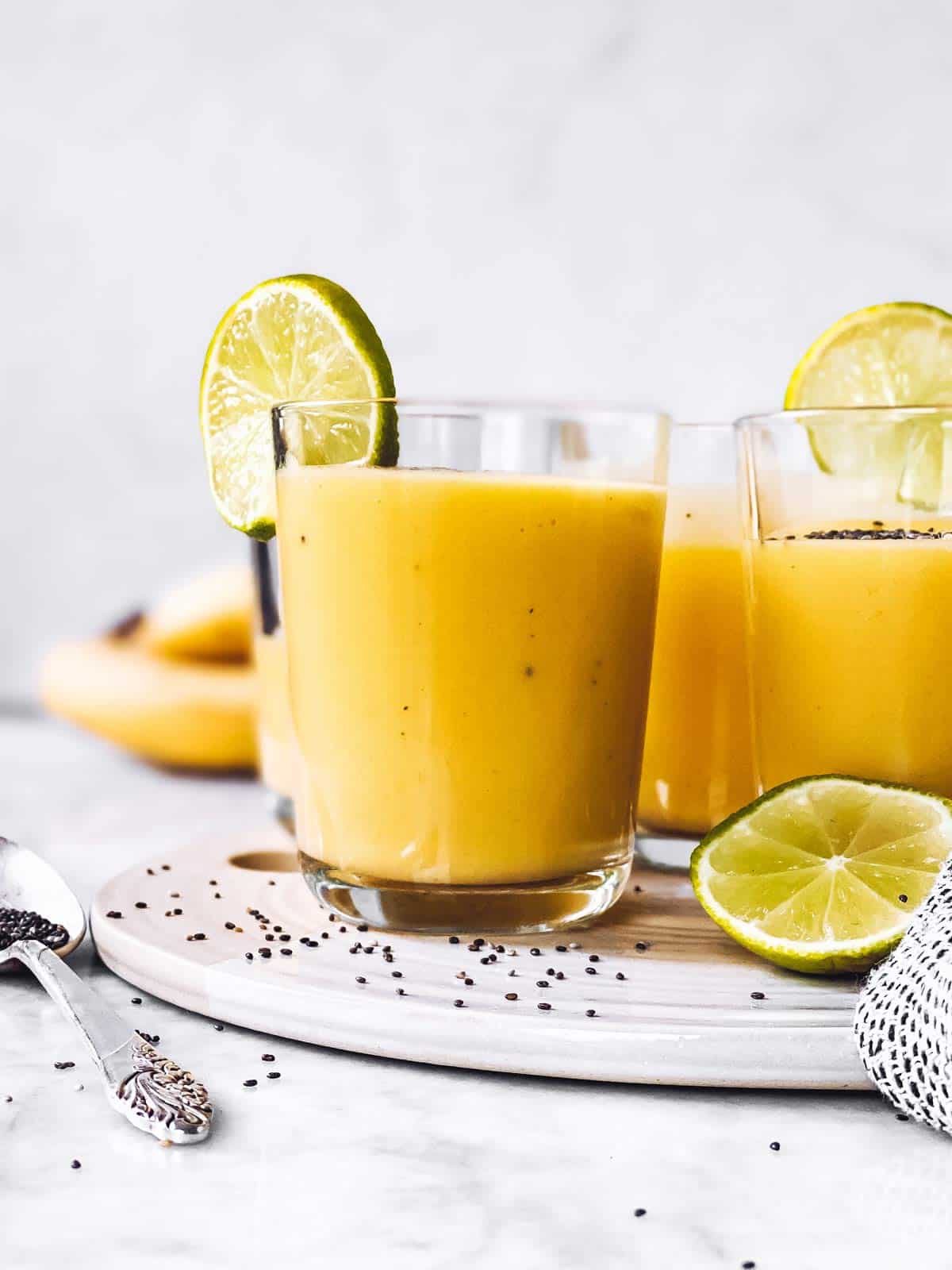 Mango banana smoothie juice jug, paths Stock Photo by maxsol7