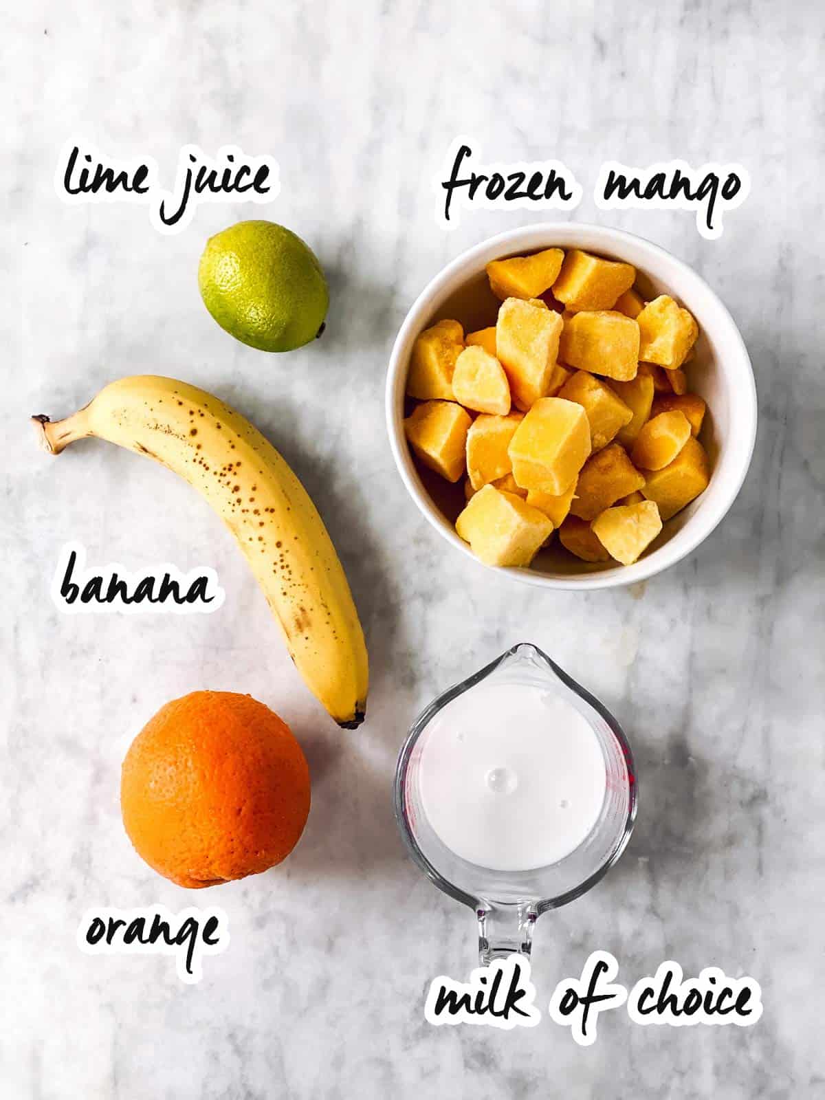 ingredients for a banana mango smoothie with text labels