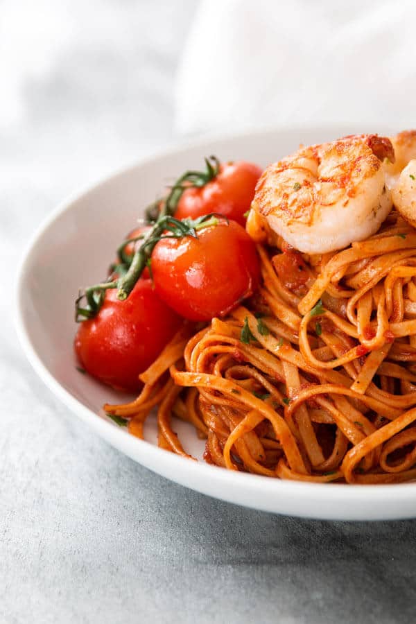 shrimp pasta on white plate