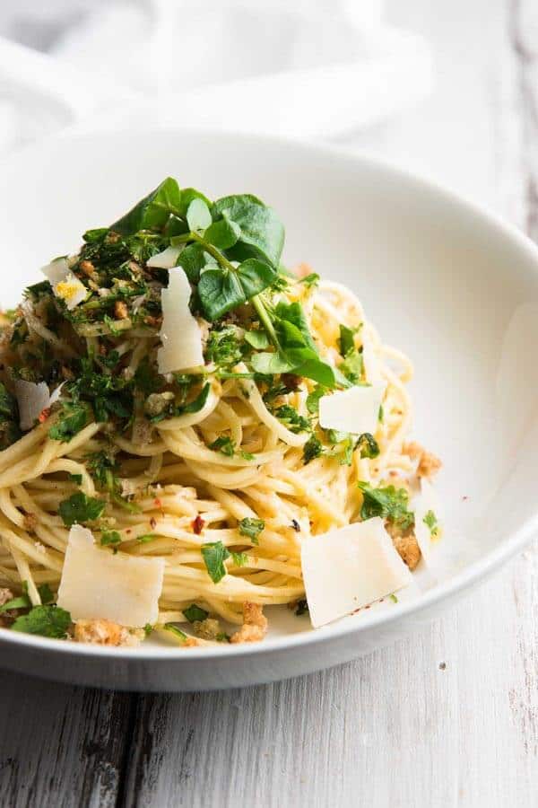garlic butter pasta on white plate