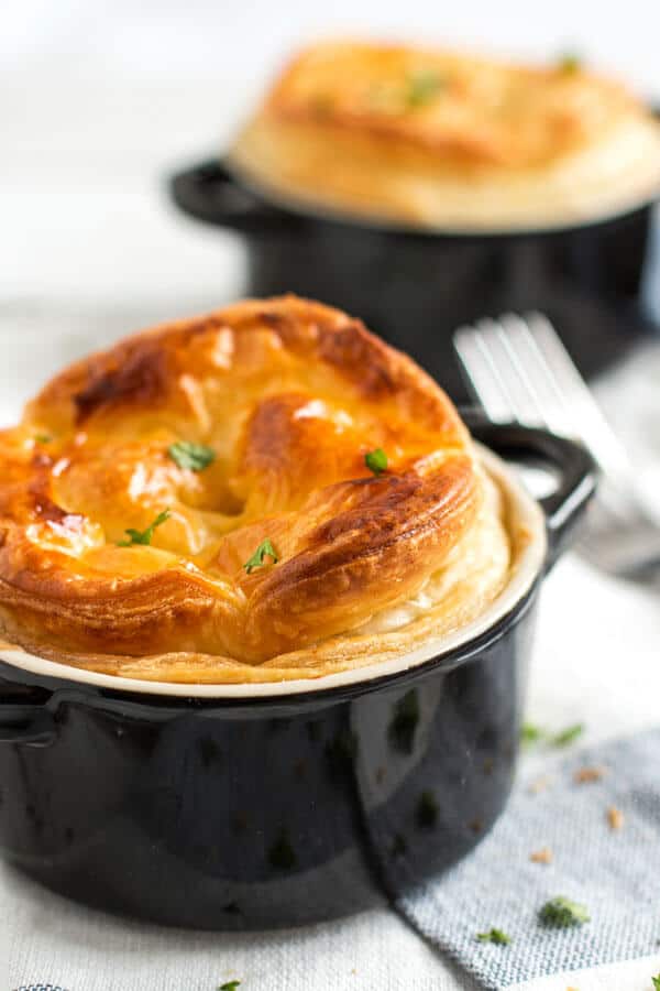 frontal view on two individual servings of chicken mushroom pot pies