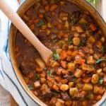 oval dutch oven filled with a classic beef stew