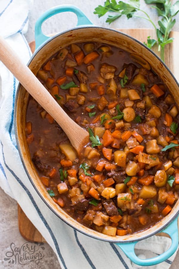 oval dutch oven filled with a classic beef stew