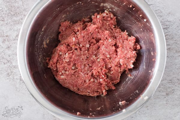 bowl with meat mix for meatballs