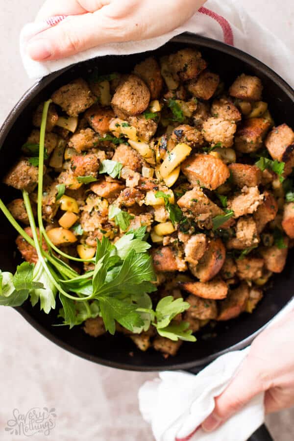 top down view on female hands holding pan with stuffing