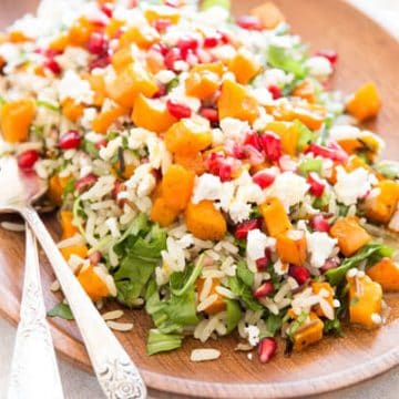 Harvest wild rice salad on a wooden platter