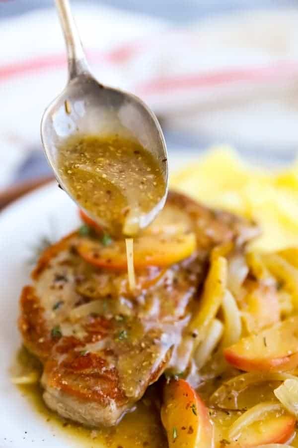 drizzling gravy over pork chops