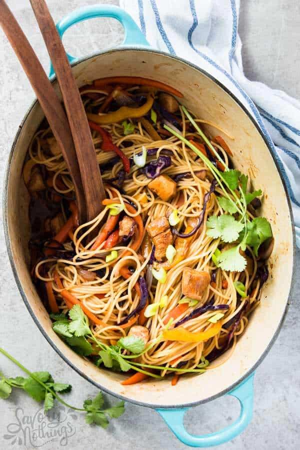 top down view on oval dutch oven filled with chicken noodles