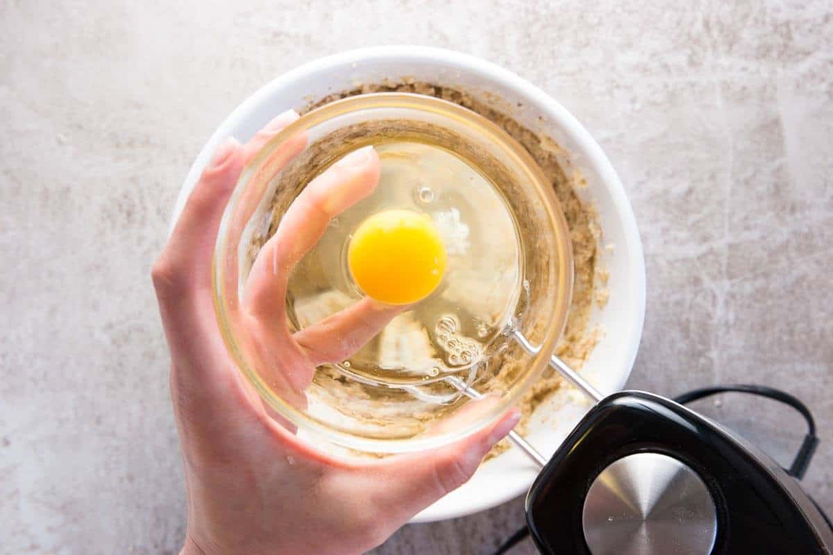 bowl with egg for oatmeal cookie dough