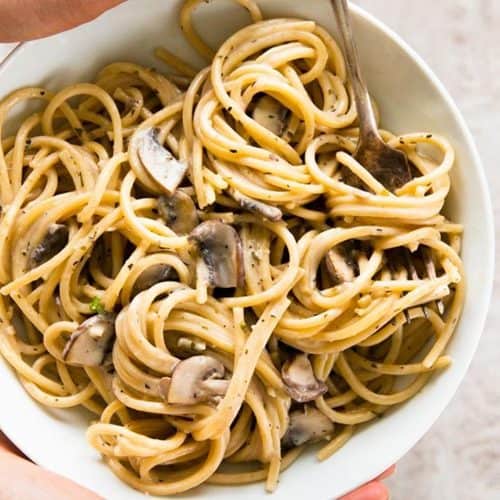 white bowl with mushroom pasta