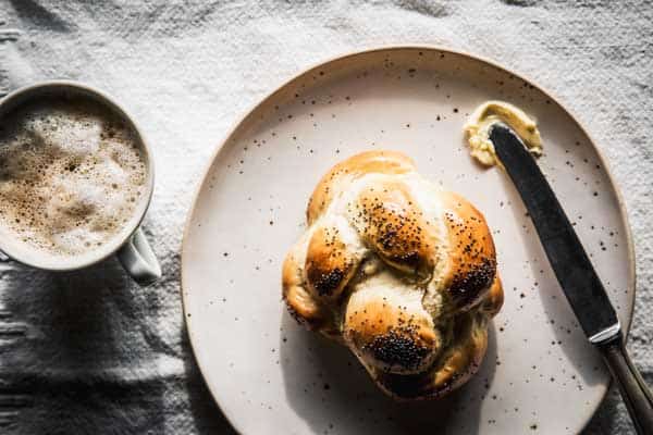 Eating Challah bread or Swiss Zopf for breakfast.