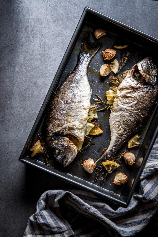 overhead view on baked whole fish fresh out of the oven