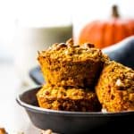 stacked pumpkin oatmeal cups on black dish