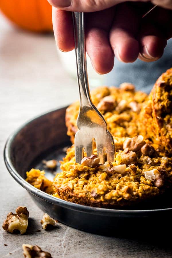 fork digging into pumpkin baked oatmeal