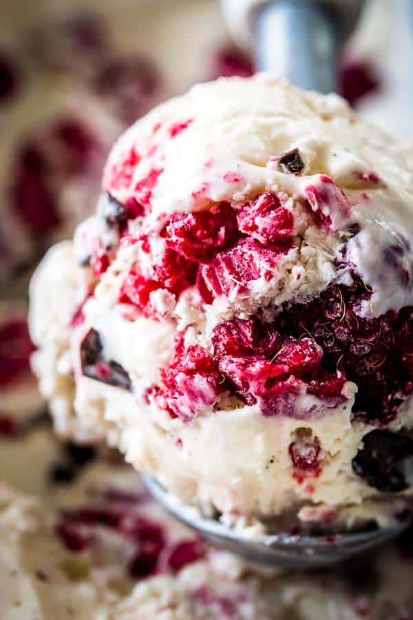 close up of a scoop of raspberry chocolate chunk ice cream