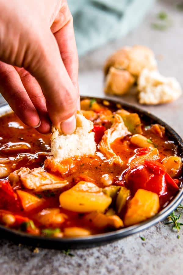 Serve a heart-warming meal out of your slow cooker tonight! This tuscan white bean crock pot chicken stew is sure to please everyone around the dinner table.