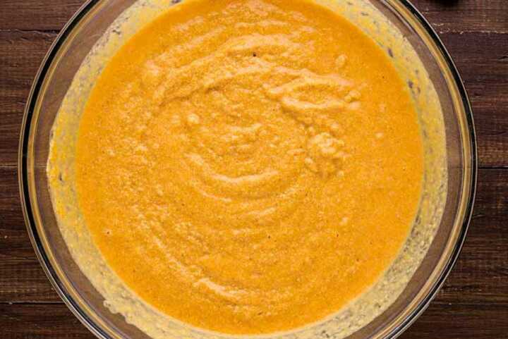 pumpkin cornbread batter in a bowl
