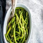 white dish with cooked green beans