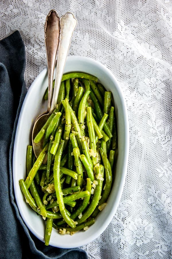 white dish with cooked green beans