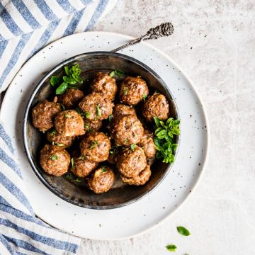 top down view on bowl with baked meatballs in a bowl