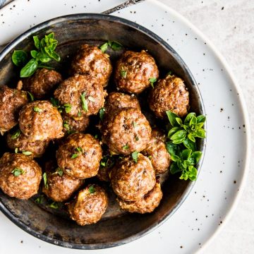 top down view on bowl with baked meatballs in a bowl