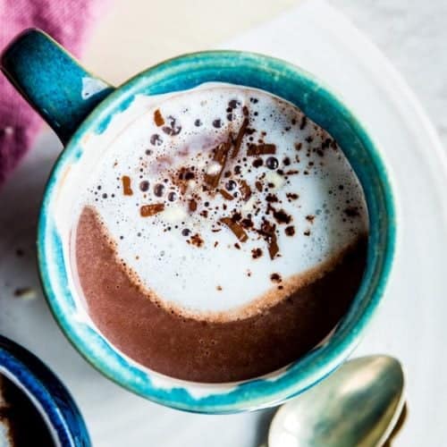 close up of blue mug with hot chocolate