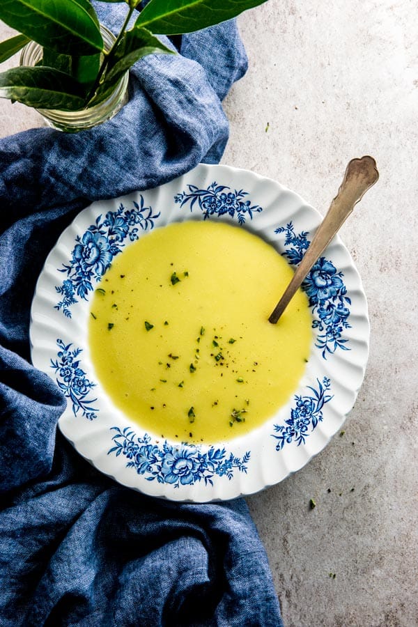 overhead view on floral plate with potato leek soup