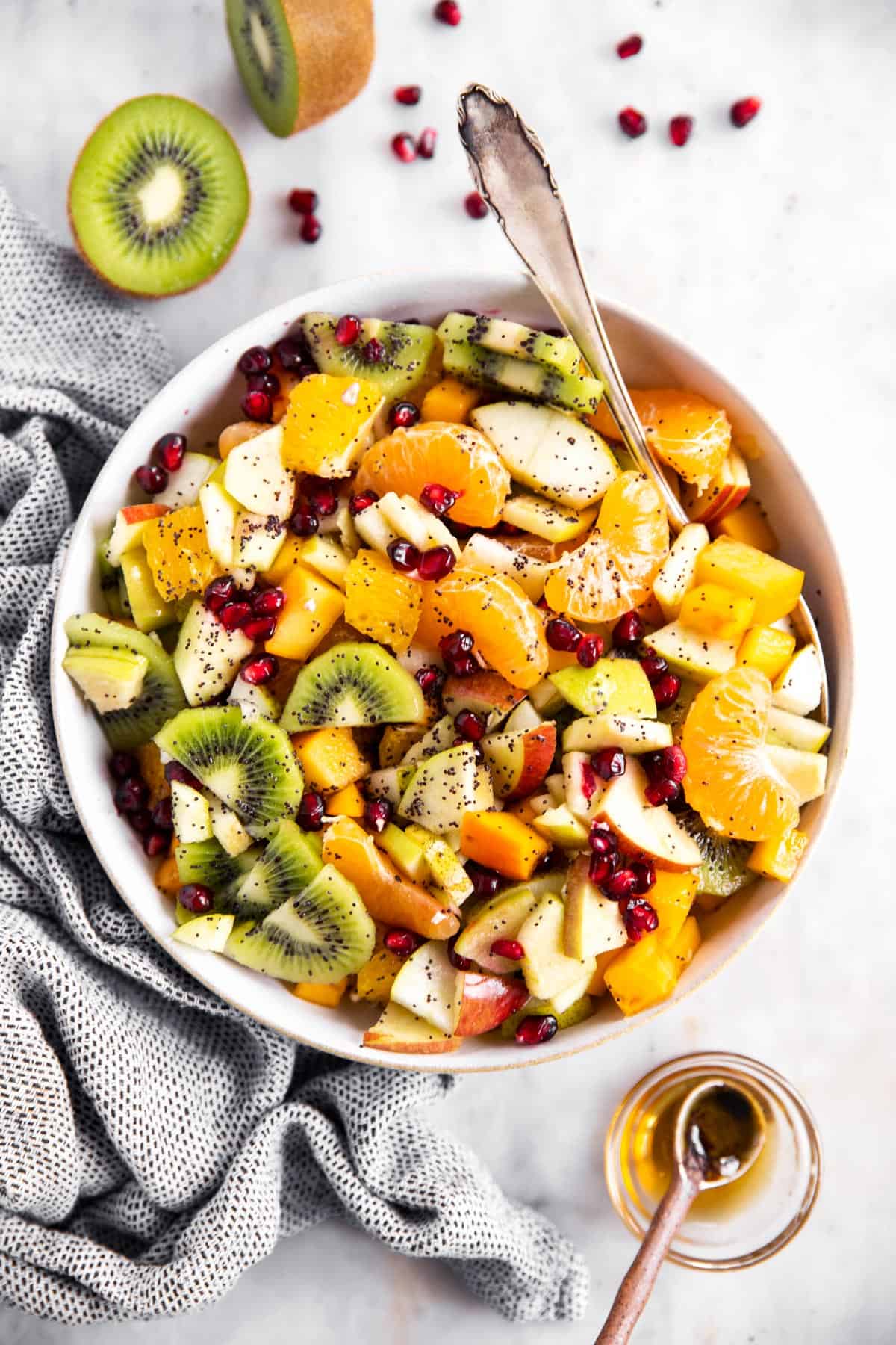 overhead view of bowl with winter fruit salad