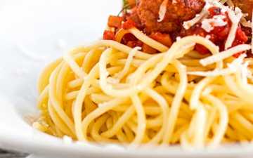 Homemade turkey meatballs in a smokey tomato sauce over spaghetti.