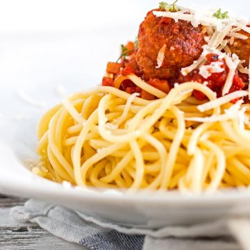 Homemade turkey meatballs in a smokey tomato sauce over spaghetti.